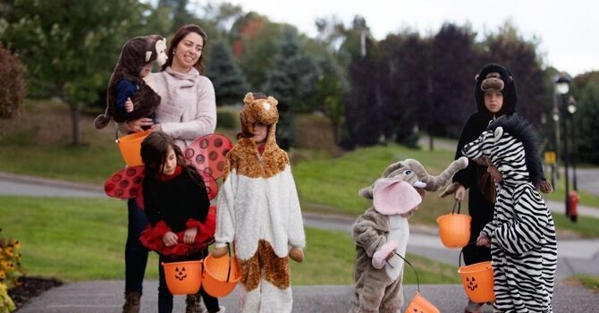 A Healthier Halloween: Tips for Parents Carrying Kids, Costumes, and Candy